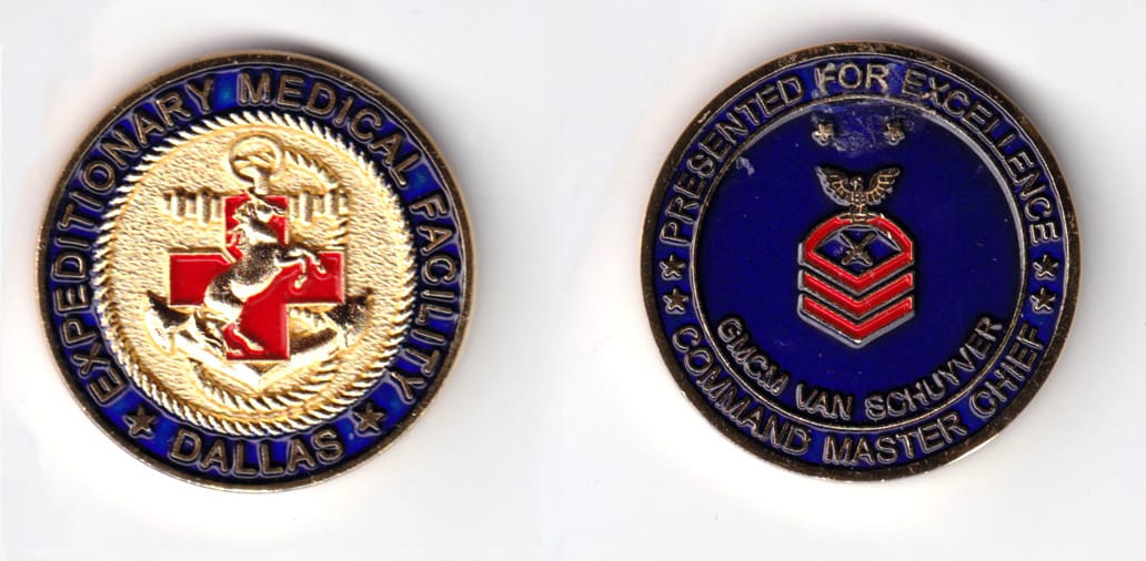 Round shaped, gold colored coin, 1-9/16 inches in diameter.