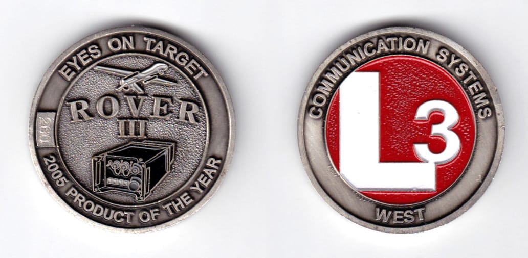 Round shaped, pewter colored coin, 1-9/16 inches in diameter.