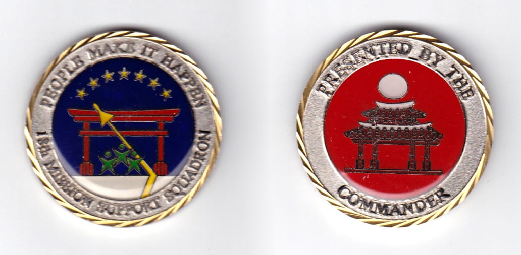 Round shaped, brass colored coin, 1-9/16 inches in diameter.