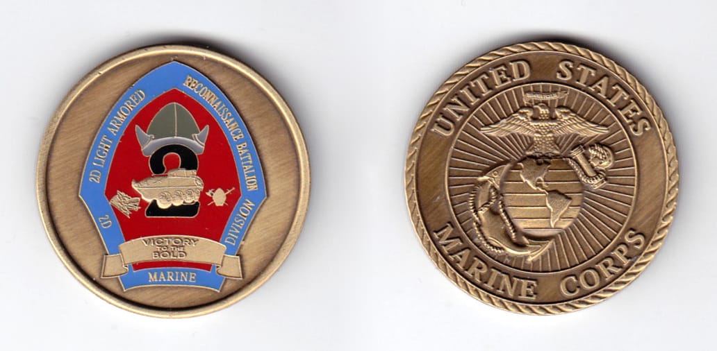 Round shaped, brass colored coin, 1-9/16 inches in diameter.