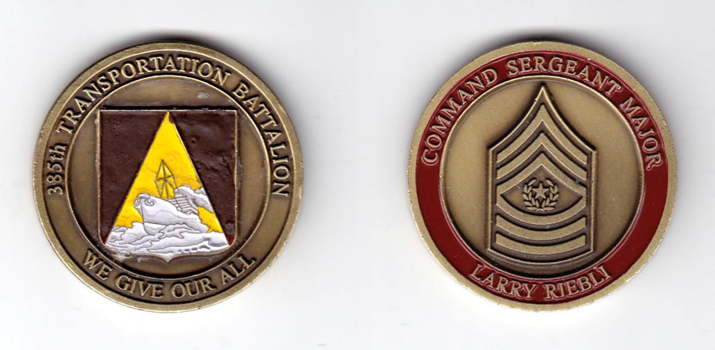 Round shaped, antique brass colored coin, 1-9/16 inches in diameter.