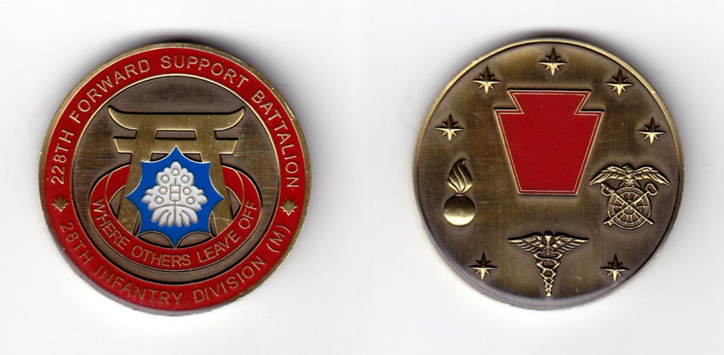 Round shaped, brass colored coin, 1-9/16 inches in diameter.