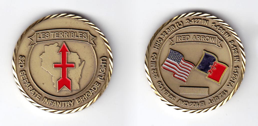 Round shaped, brass colored coin, 1-9/16 inches in diameter.