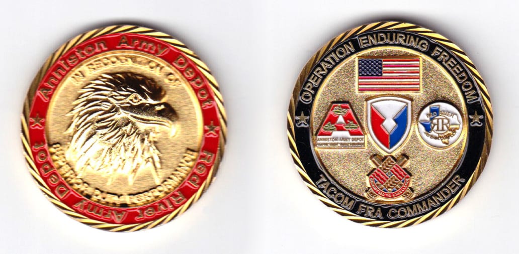 Round shaped, gold colored coin, 1-1/2 inches in diameter.