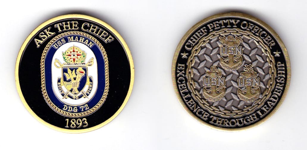 Round shaped, brass colored coin, 1-1/2 inches in diameter.