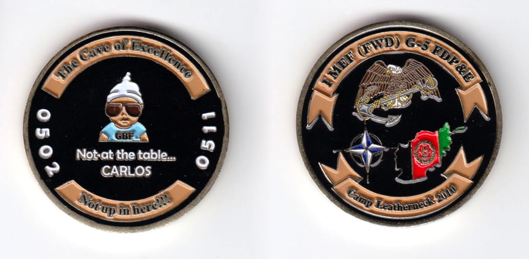 Round shaped, brass colored coin, 1-1/2 inches in diameter.