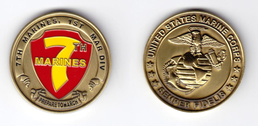 Round shaped, brass colored coin, 1-9/16 inches in diameter.