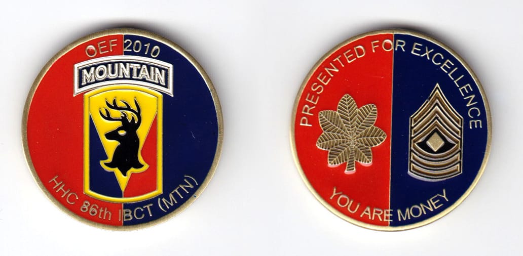 Round shaped, brass colored coin, 1-1/2 inches in diameter.