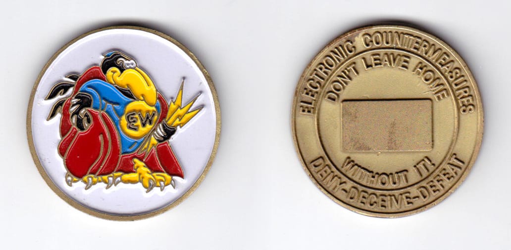 Round shaped, brass colored coin, 1-1/2 inches in diameter.