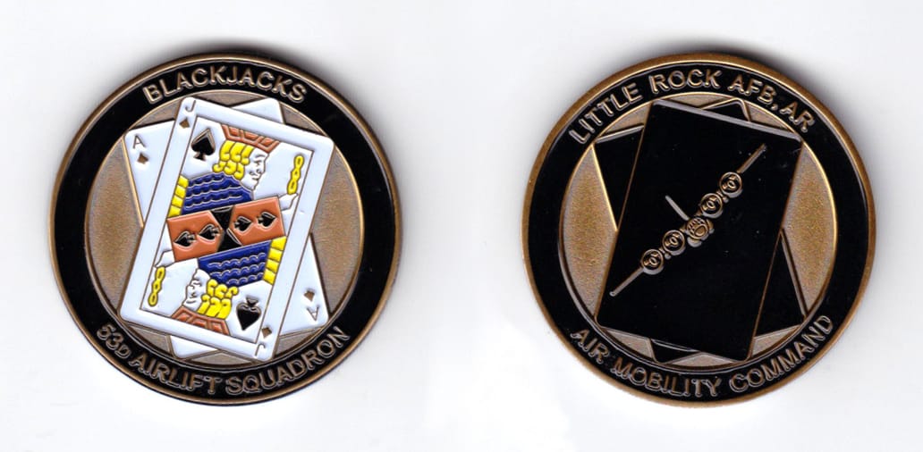 Round shaped, antique brass colored coin, 1-1/2 inches in diameter.