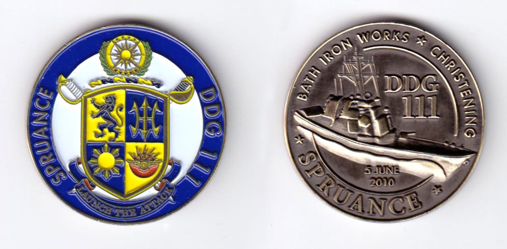 Round shaped, antique brass colored coin, 1-1/2 inches in diameter.