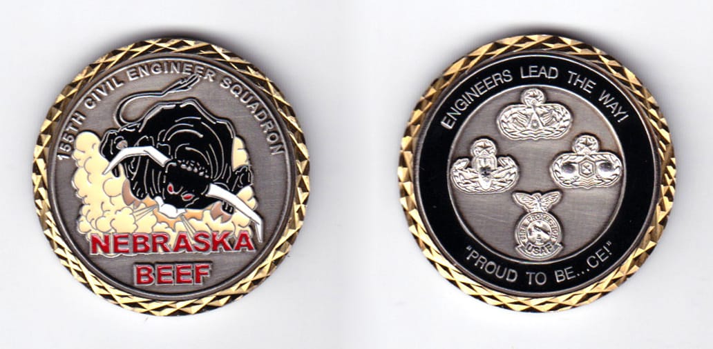 Round shaped, brass colored coin, 1-1/2 inches in diameter.