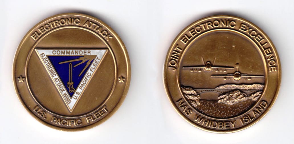 Round shaped, brass colored coin, 1-1/2 inches in diameter.