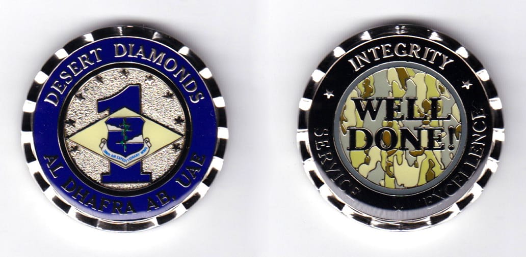 Round shaped, silver colored coin, 1-1/2 inches in diameter.