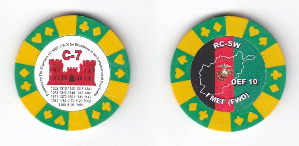 Round shaped, green & yellow colored poker chip, 1-1/2 inches in diameter.