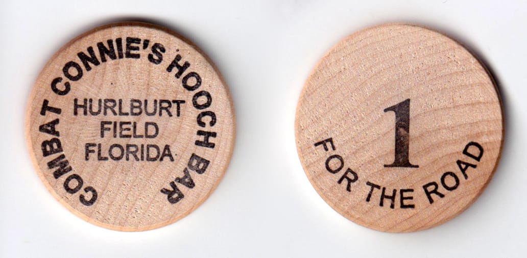 Round shaped, wooden poker chip, 1-1/2 inches in diameter.