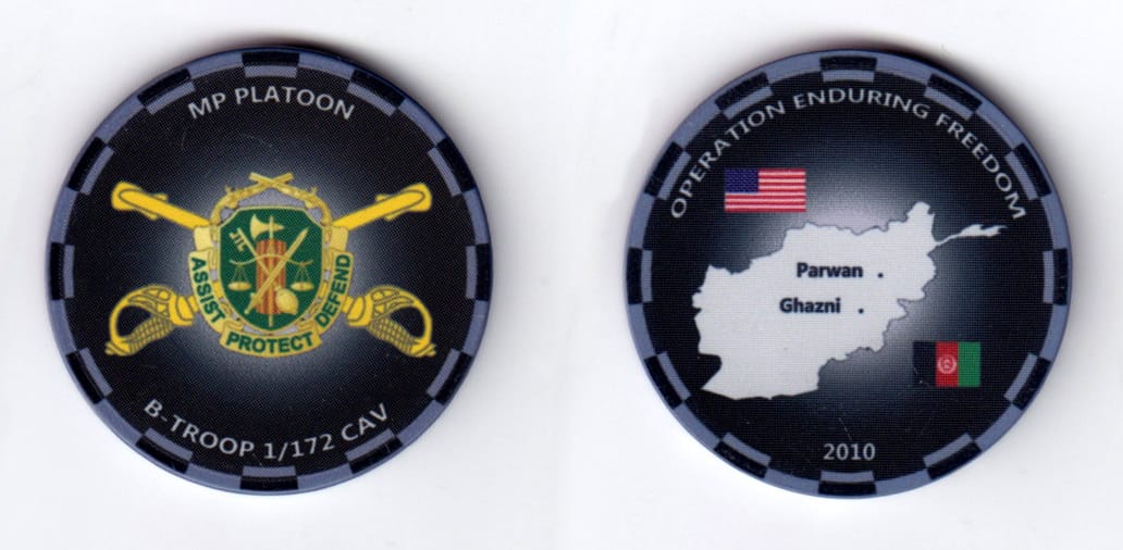 Round shaped, black & gray colored poker chip, 1-5/8 inches in diameter.