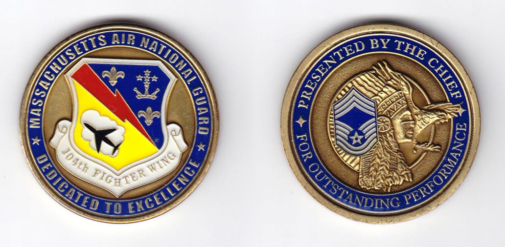 Round shaped, brass colored coin, 1-5/8 inches in diameter.