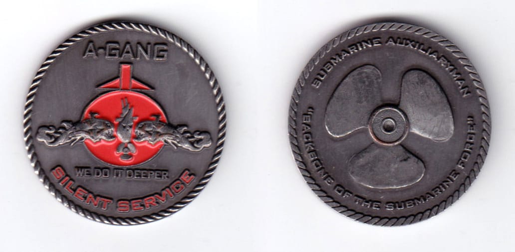 Round shaped, pewter colored coin, 1-1/2 inches in diameter.