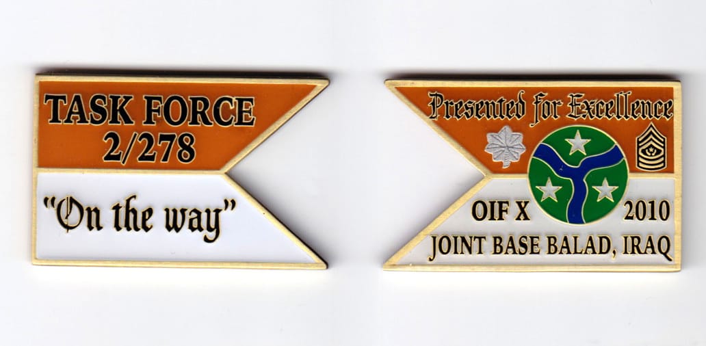 Guidon shaped, brass colored coin, 2 inches wide x 1-3/8 inches high.