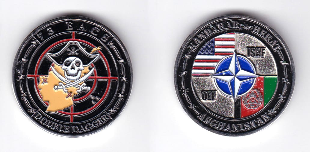 Round shaped, silver colored coin, 1-1/2 inches in diameter.