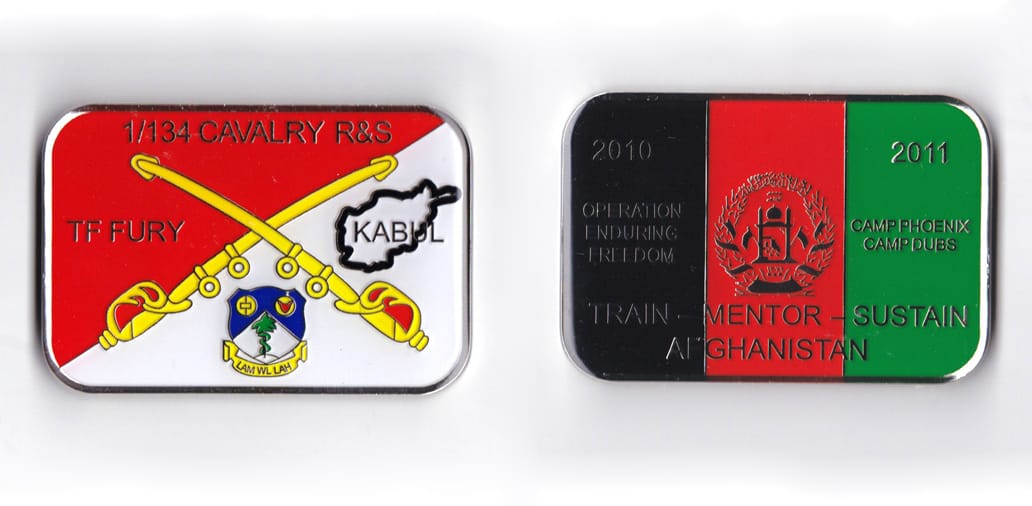 Retangualr shaped, silver colored coin, 2-1/2 inches wide x 1-3/4 inches high.