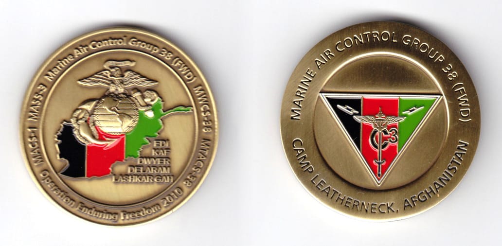 Round shaped, brass colored coin, 1-3/4 inches in diameter.