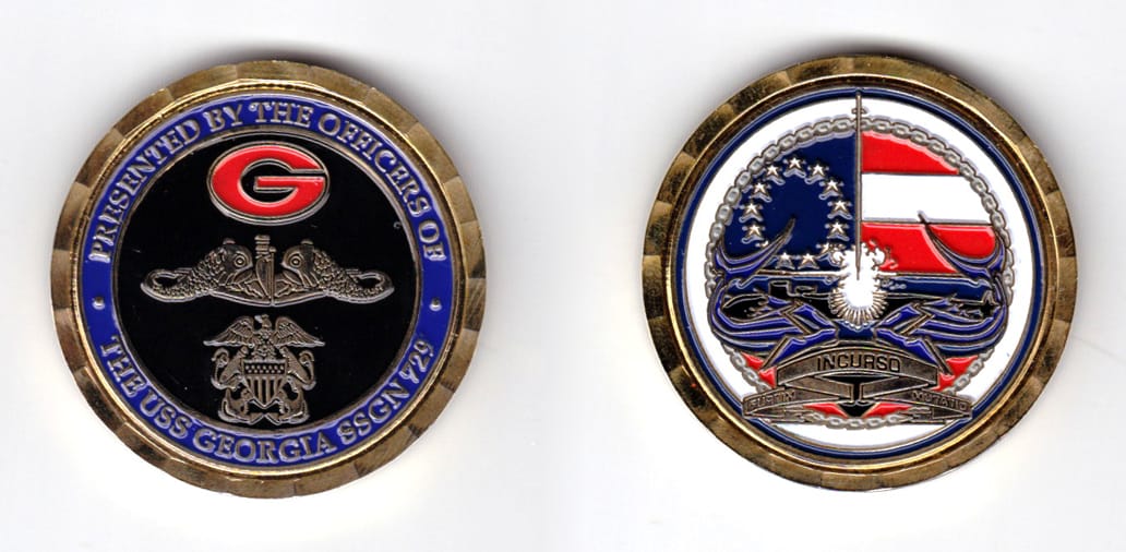 Round shaped, gold colored coin, 1-3/4 inches in diameter.