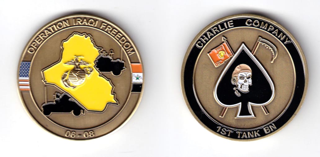 Round shaped, brass colored coin, 1-3/4 inches in diameter.