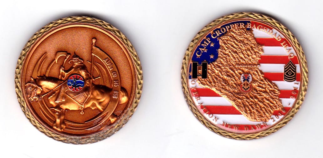 Round shaped, brass & copper colored coin, 1-3/4 inches in diameter.