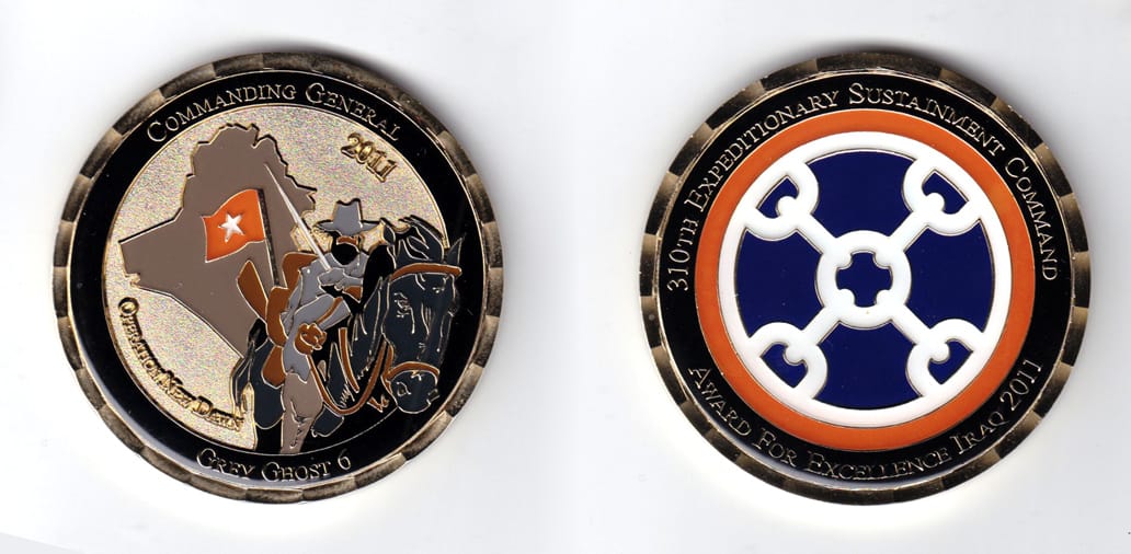 Round shaped, gold colored coin, 2-1/2 inches in diameter.