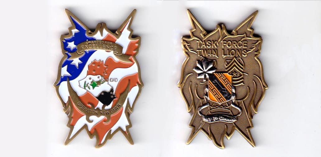 Lion head shaped, brass colored coin, 1-3/8 inches wide x 2-1/4 inches high.