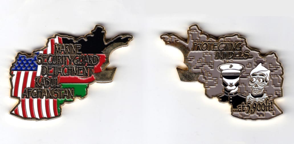 Afghanistan shaped, gold colored coin, 2-1/2 inches wide x 2 inches high.