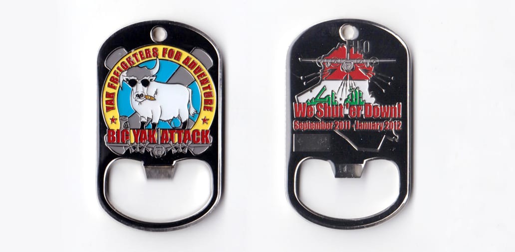 Dog tag shaped, with bottle opener, silver colored coin, 1-1/2 inches wide x 2-1/2 inches high.