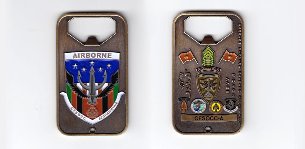 Dog tag shaped, with bottle opener, antique brass colored coin, 1-5/8 inches wide x 2-3/4 inches high.