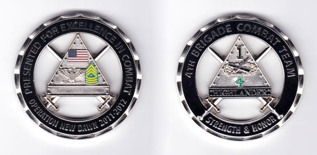 Round shaped, silver colored coin, 2-1/2 inches in diameter.