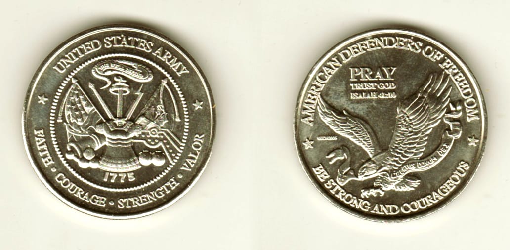 Round shaped, silver colored coin, 1 1/2 inches in diameter.