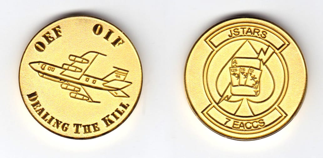 Round shaped, gold colored coin, 1-3/8  inches in diameter.