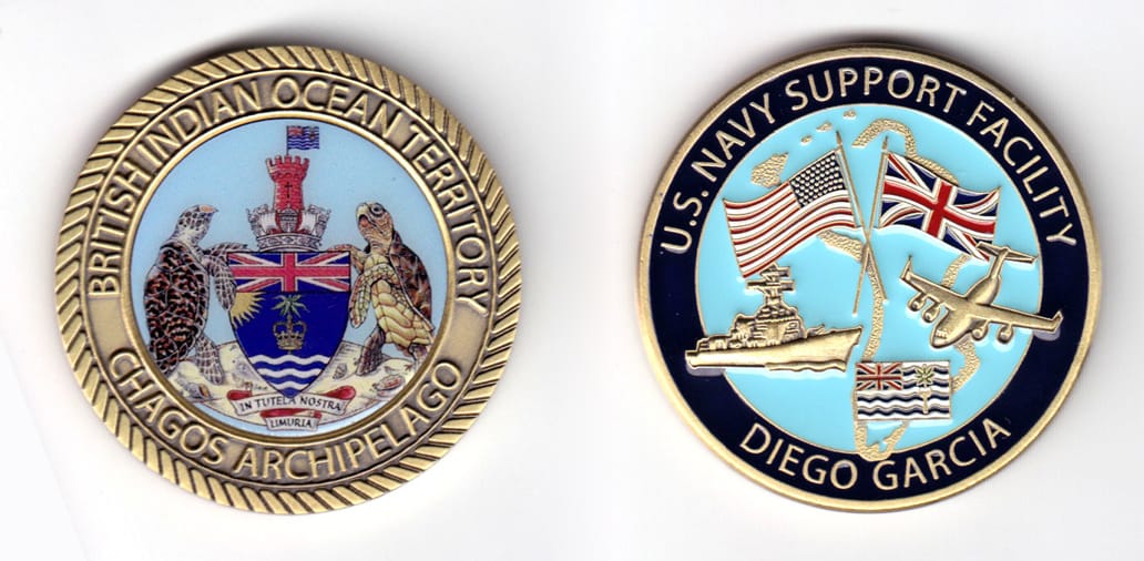 Round shaped, brass colored coin, 2 inches in diameter.