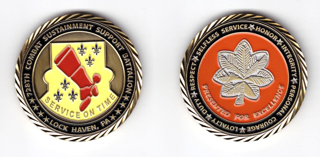 Round shaped, brass colored coin, 2 inches in diameter.