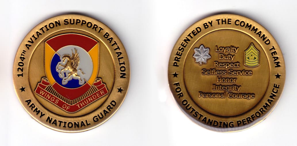 Round shaped, brass colored coin, 2 inches in diameter.