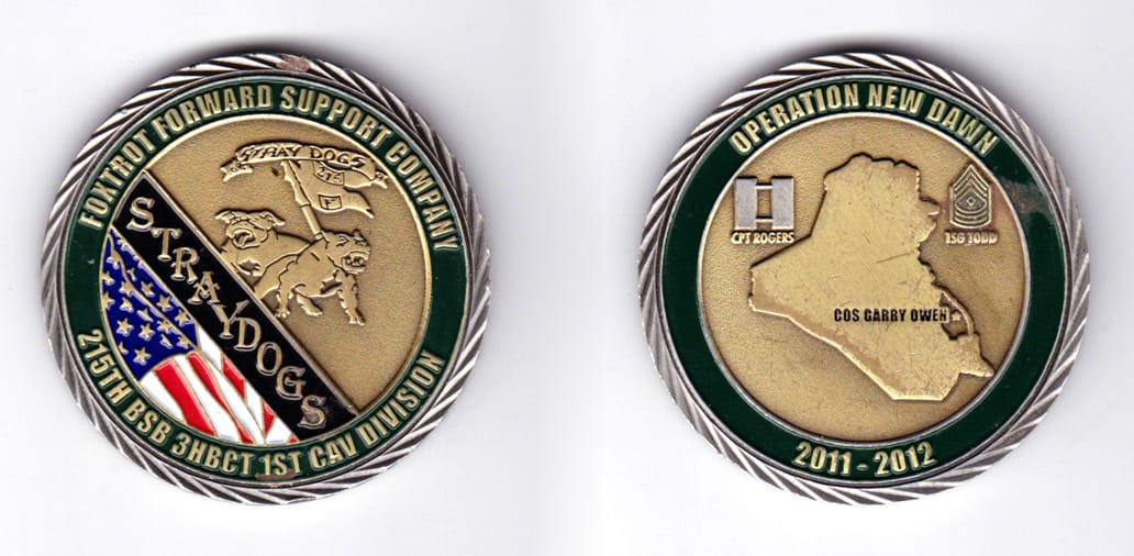 Round shaped, pewter colored coin, 2 inches in diameter.