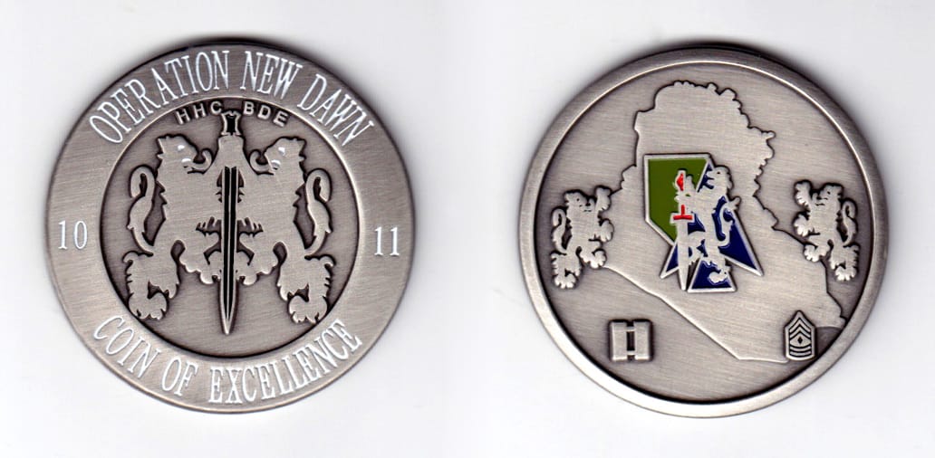 Round shaped, silver colored coin, 2 inches in diameter.