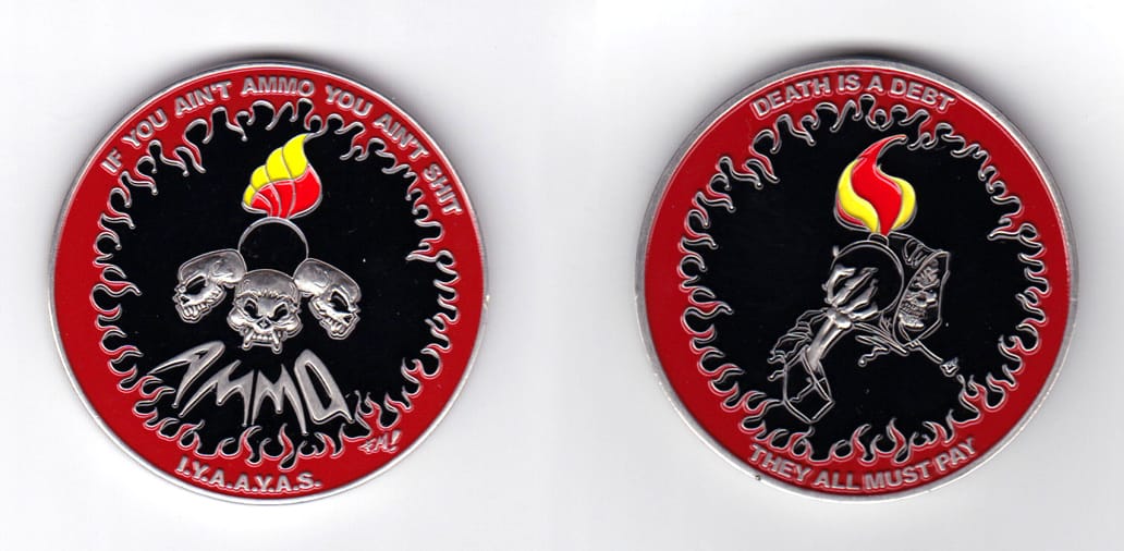 Round shaped, pewter colored coin, 2 inches in diameter.