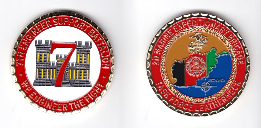 Round shaped, brass colored coin, 2 inches in diameter.