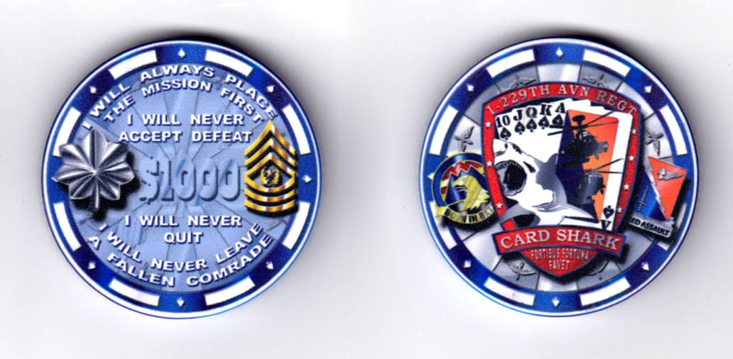 Round shaped, blue colored poker chip, 2 inches in diameter.