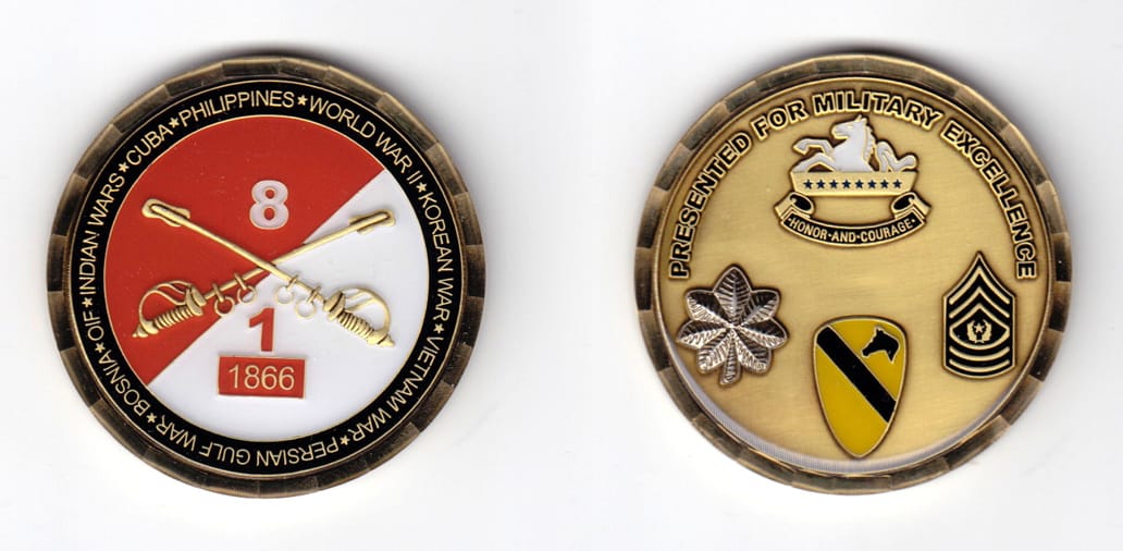 Round shaped, brass colored coin, 2 inches in diameter.