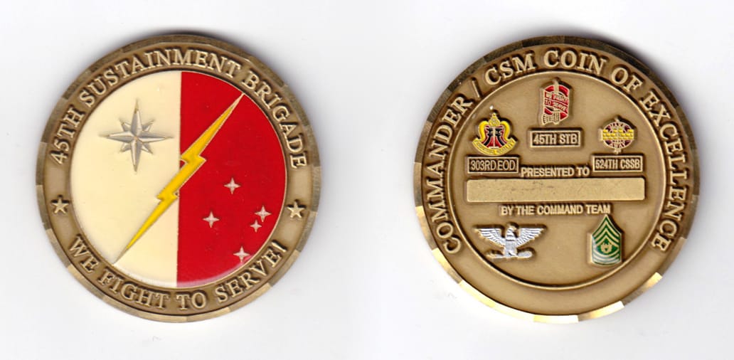 Round shaped, brass colored coin, 2 inches in diameter.