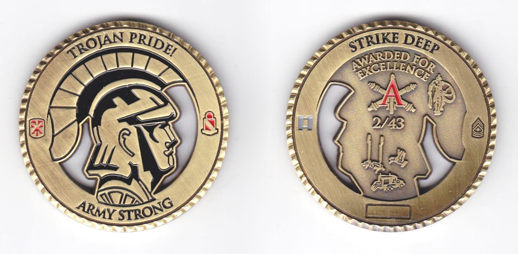 Round shaped, brass colored coin, 2 inches in diameter.