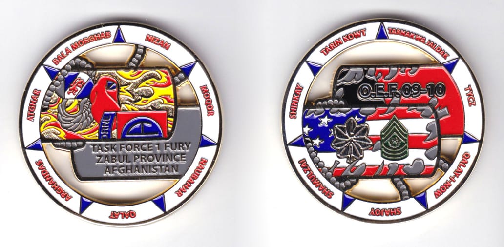 Round shaped, gold colored coin, 2 inches in diameter.